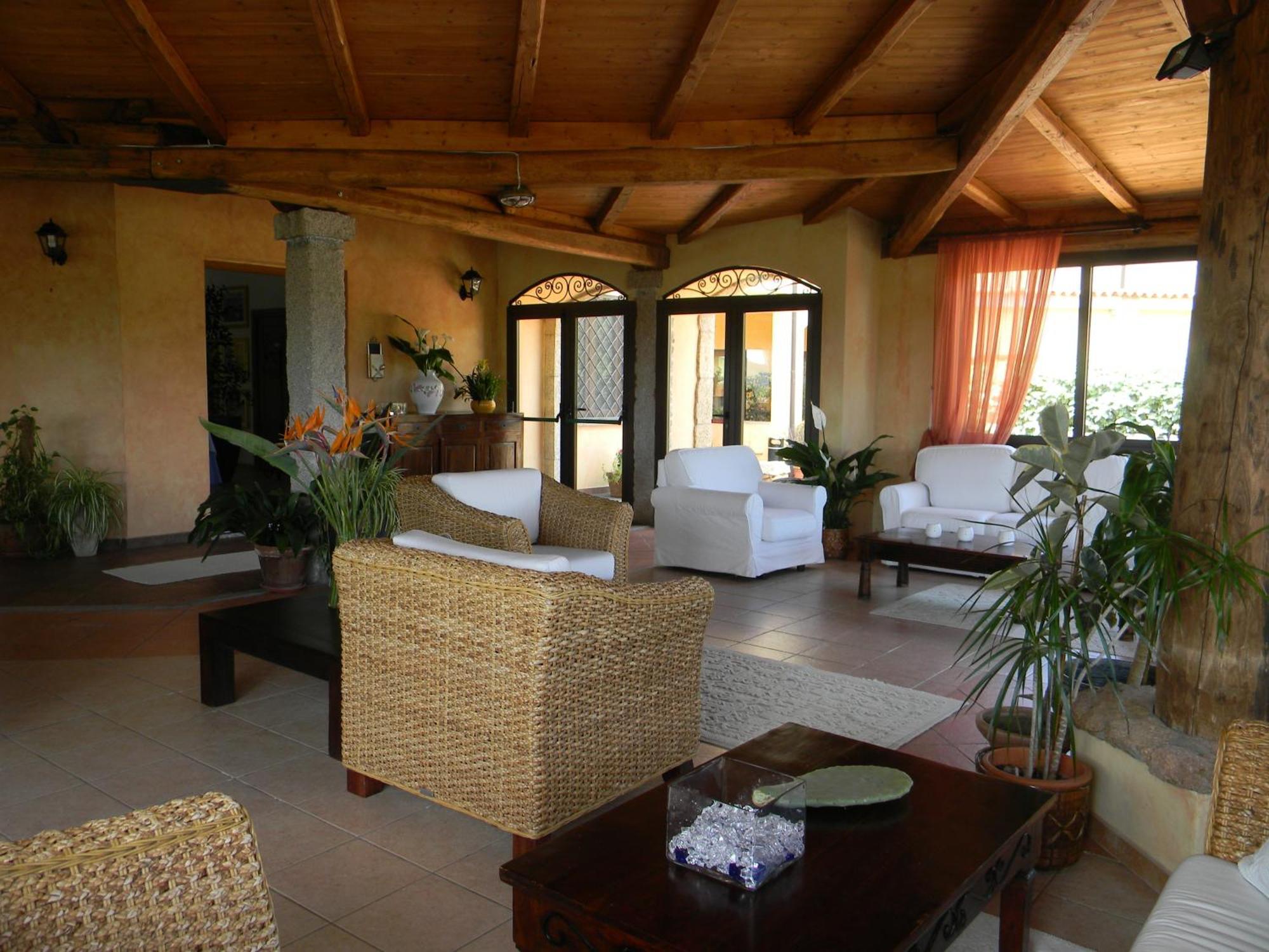 Relais Fenicottero Rosa Guest House Porto Taverna Bagian luar foto