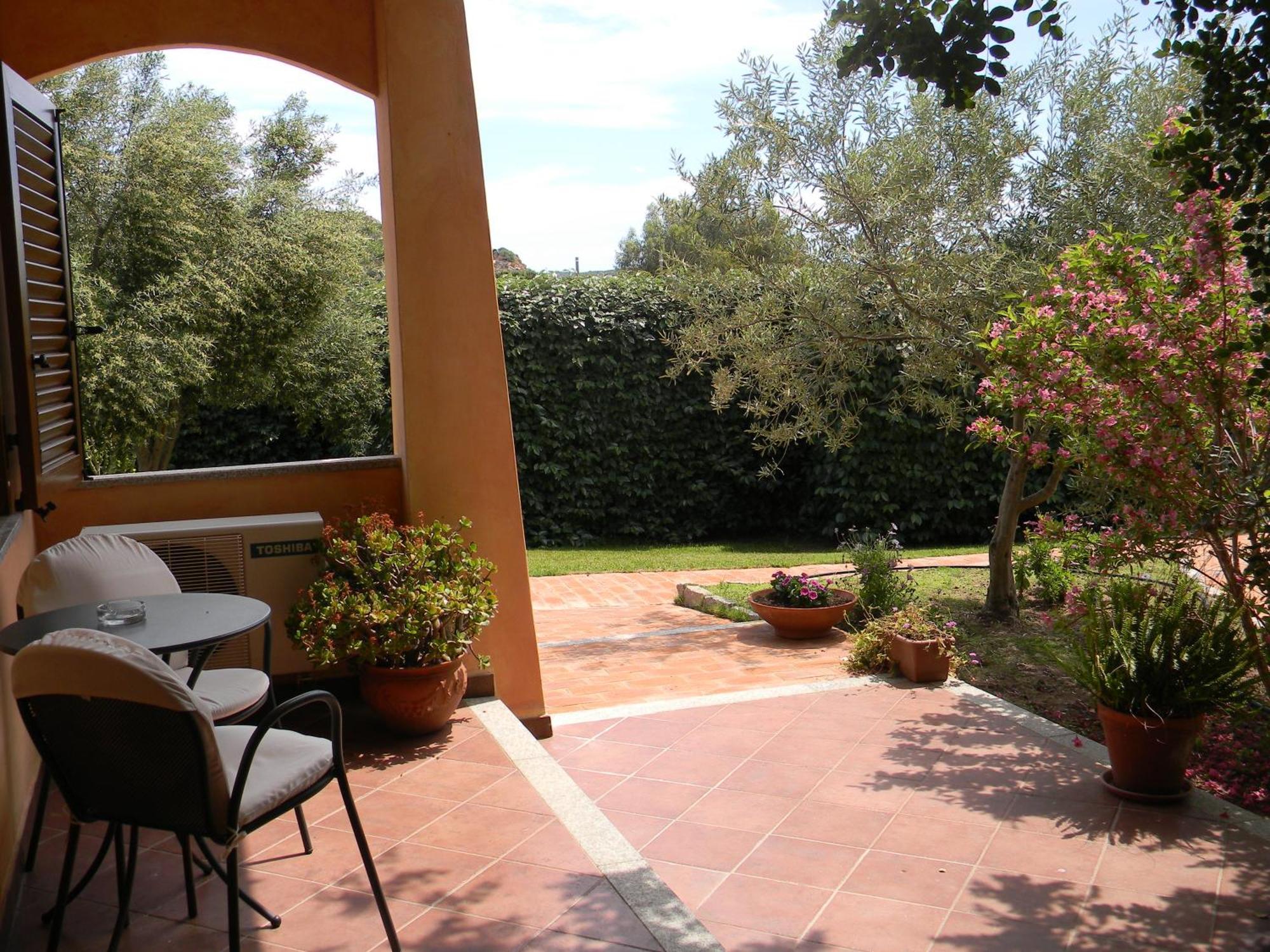 Relais Fenicottero Rosa Guest House Porto Taverna Bagian luar foto