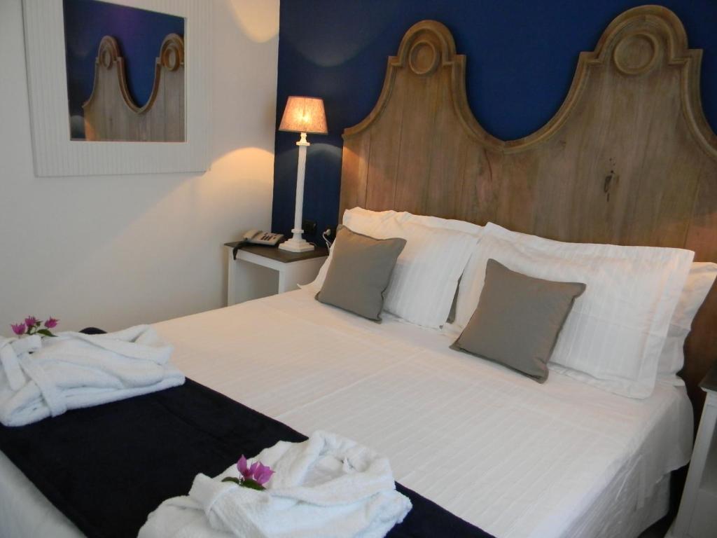 Relais Fenicottero Rosa Guest House Porto Taverna Bagian luar foto
