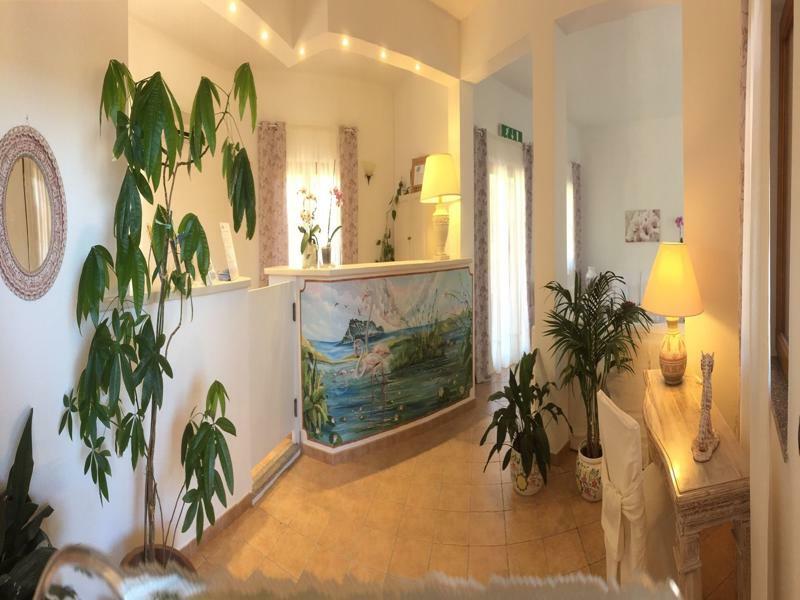 Relais Fenicottero Rosa Guest House Porto Taverna Bagian luar foto